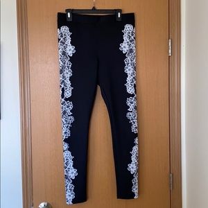 Express black leggings with white floral pattern